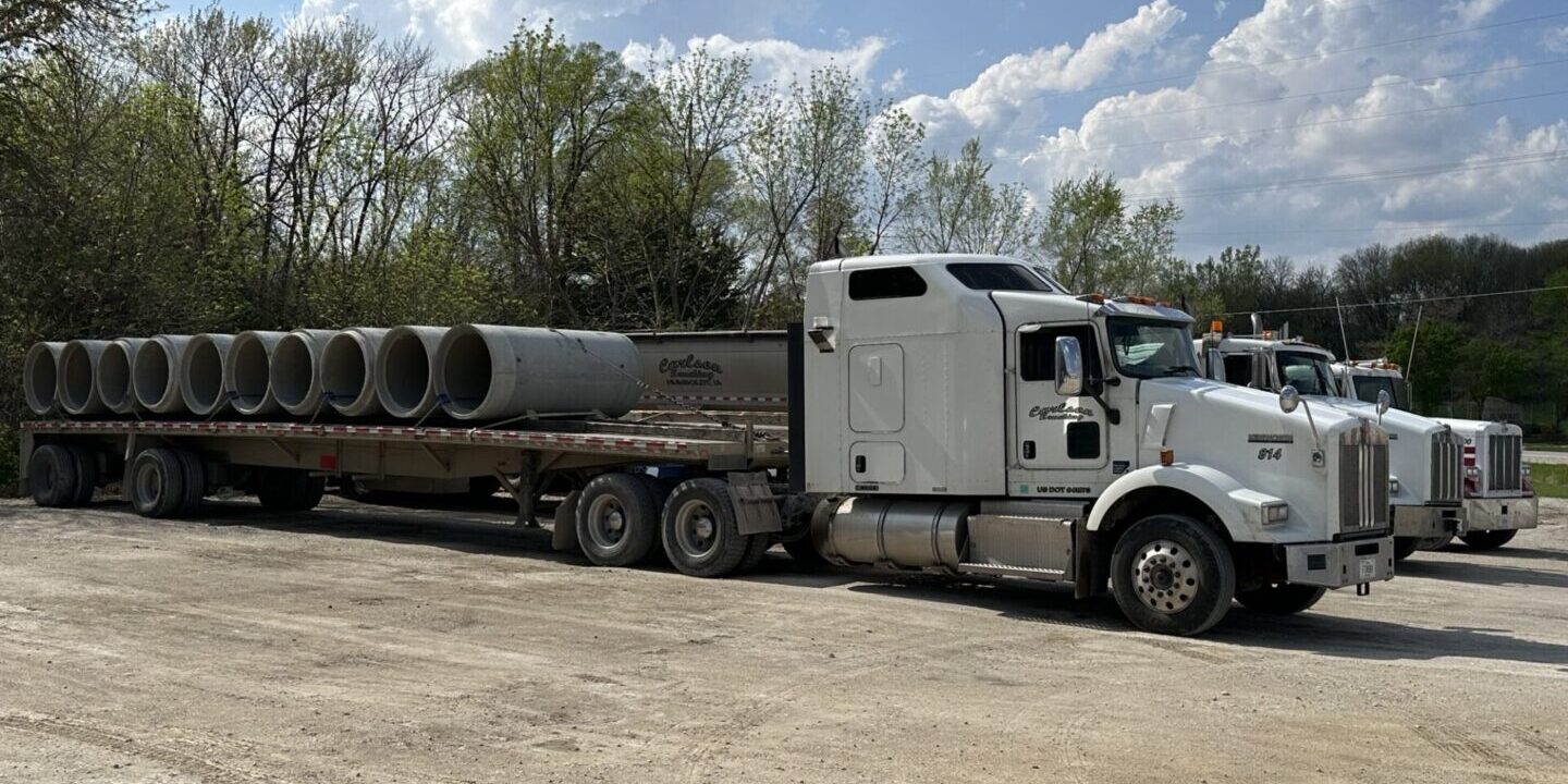 Truck with load of pipe